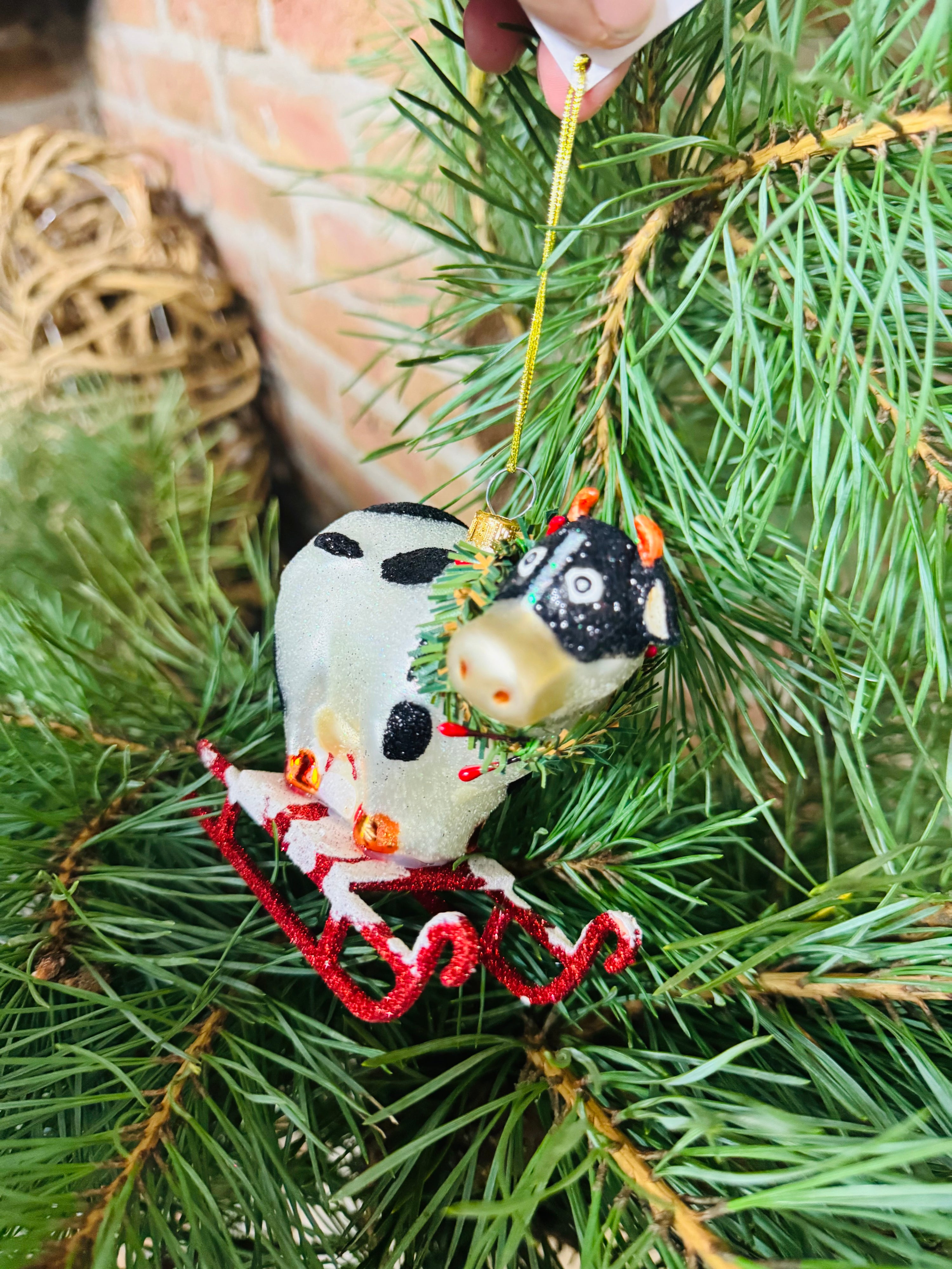 Baumanhänger Kuh auf Schlitten