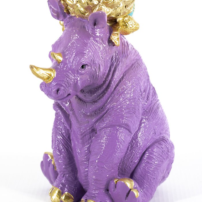 Kerzenhalter mit Papagei und Nashorn